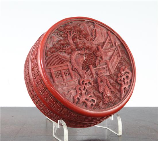 A Chinese cinnabar lacquer box and cover, 19th century, 10cm diam.